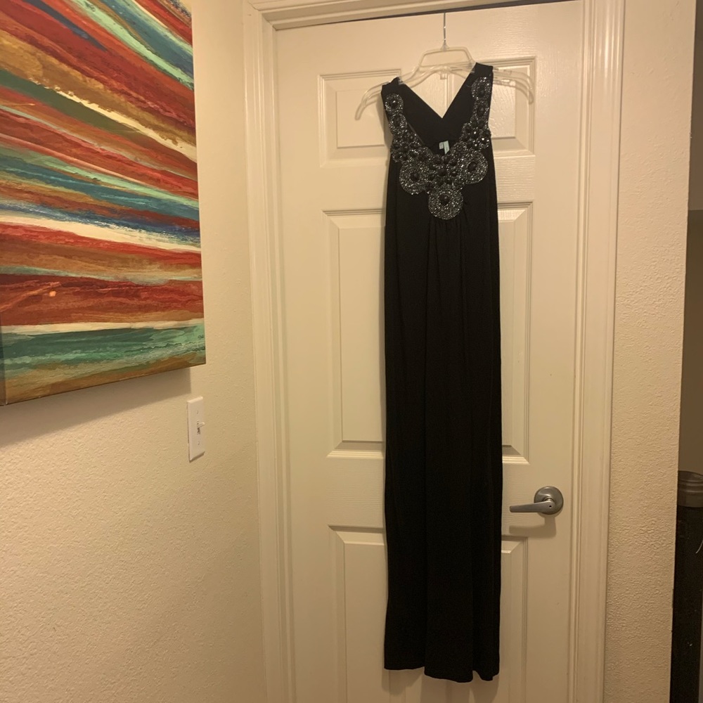 Black Maurices gown with beaded filigree detail